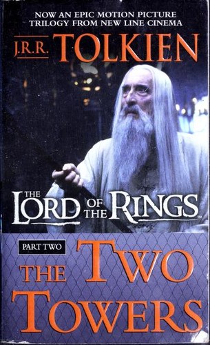 Cover of the 2001 Ballantine Books movie tie-in paperback edition of The Two Towers by J.R.R. Tolkien, showing Saruman holding a staff.